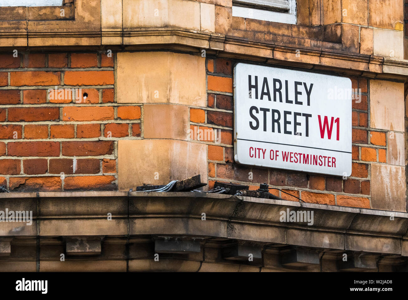 Harley Street W1 street signs in Central London. Harley Street is known for its numerous specialist medical and surgical practices. Stock Photo