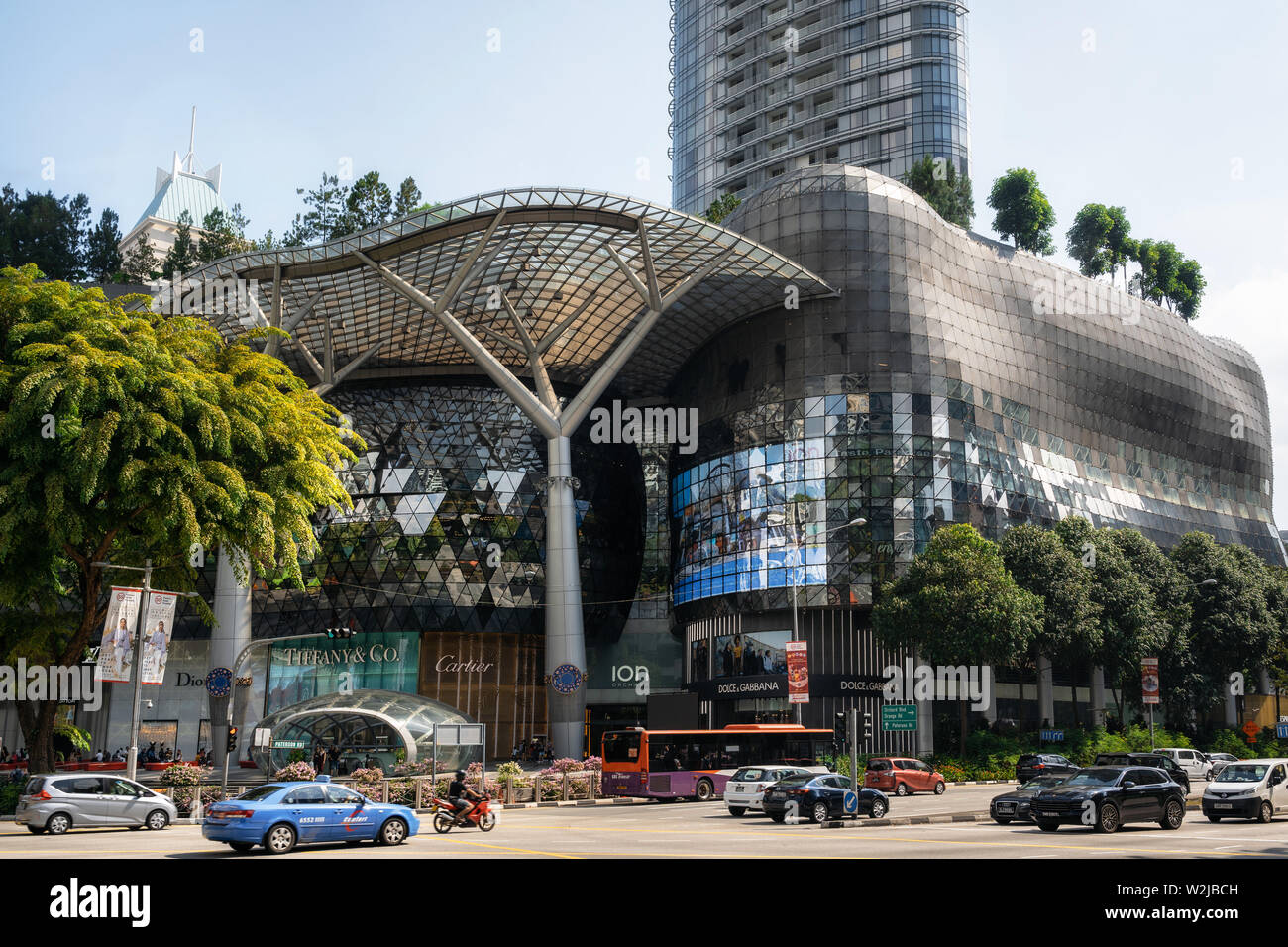 Singapore - February 9, 2019: Ultramodern facade of ION Orchard, formerly known as the Orchard Turn Development or Orchard Turn Site made with cutting Stock Photo