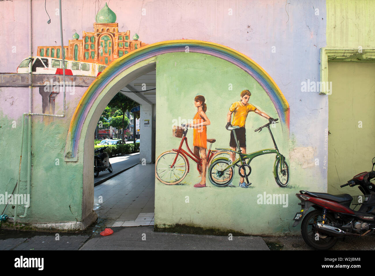 kuala lumpur, malaysia- 2017.03.06: old town,  - mural / graffiti depicting young people and bicycles Stock Photo