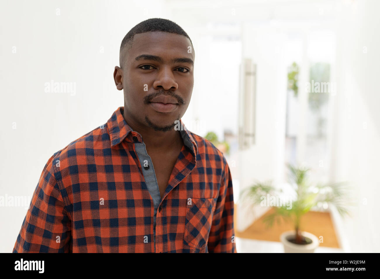 African adult man standing hi-res stock photography and images - Alamy