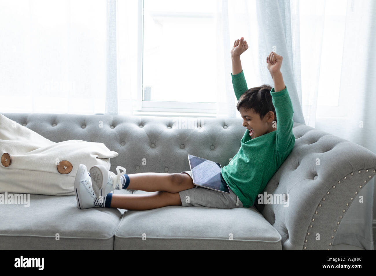 Boy playing games hi-res stock photography and images - Alamy