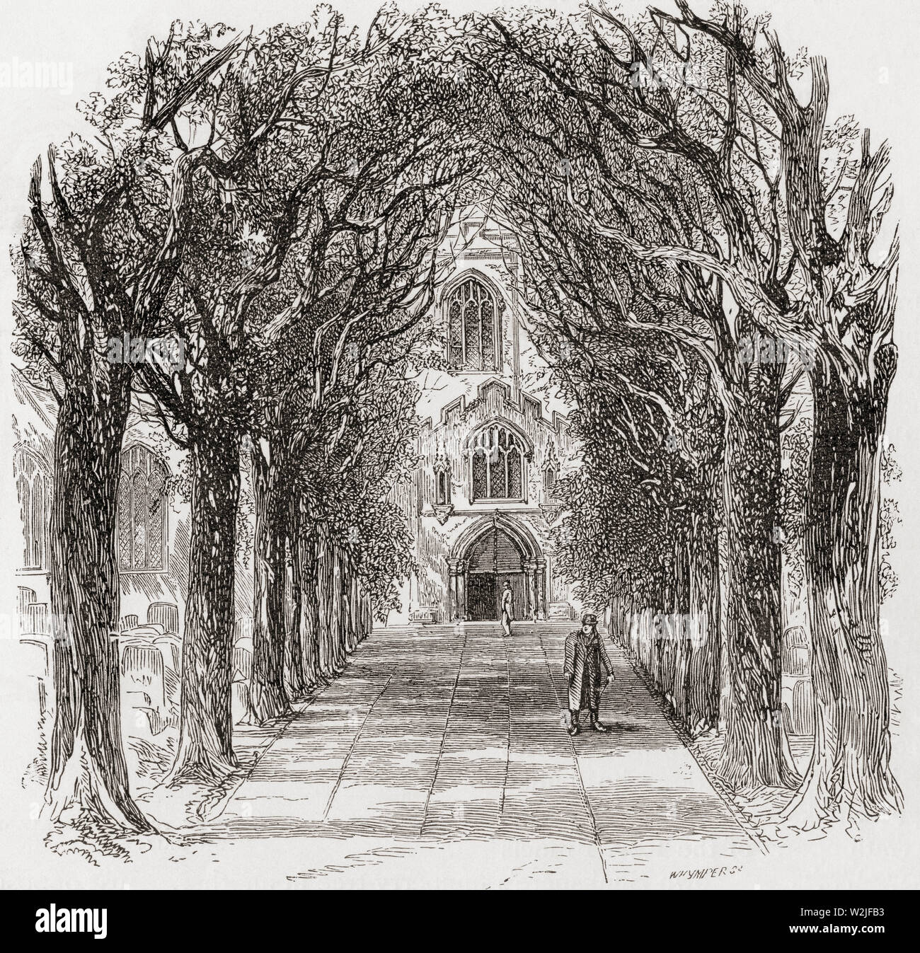The Collegiate Church of the Holy and Undivided Trinity, Stratford-upon-Avon, England.  The avenue leading to the door, seen here in the 19th century.  This church was the place of baptism and burial of William Shakespeare.  From English Pictures, published 1890. Stock Photo