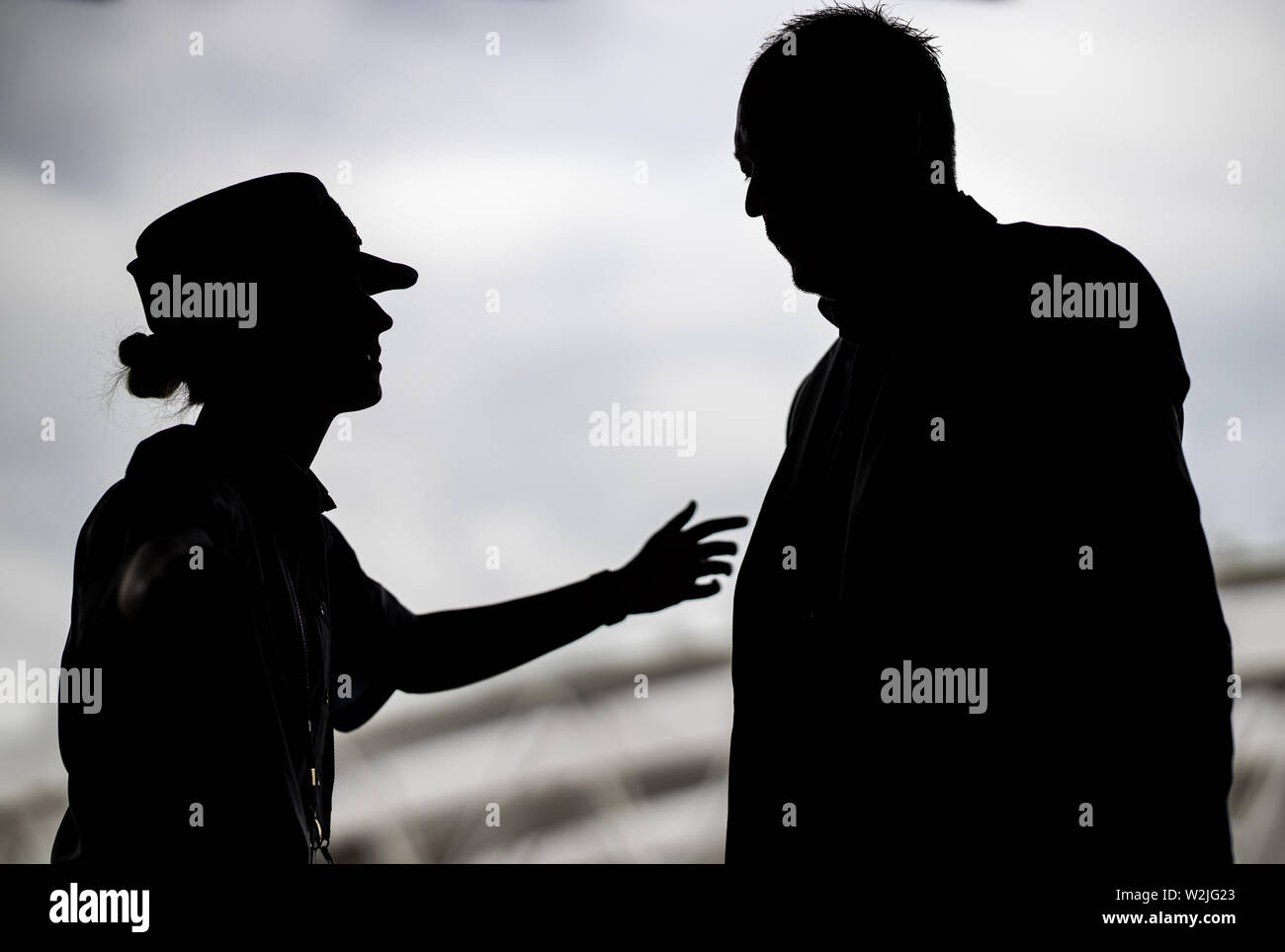 A member of the armed forces guarding an entrance to centre court on day eight of the Wimbledon Championships at the All England Lawn Tennis and Croquet Club, Wimbledon. Stock Photo