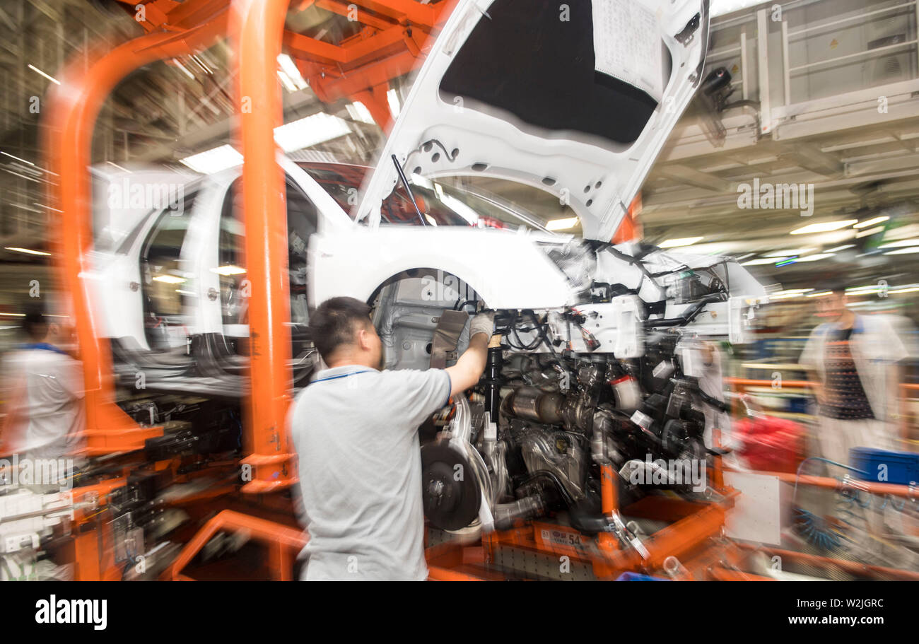 Changchun, China's Jilin Province. 9th July, 2019. A worker assembles an Audi vehicle at FAW-Volkswagen factory in Changchun, northeast China's Jilin Province, July 9, 2019. The Sino-German auto joint venture FAW-Volkswagen said a record 311,871 Audi vehicles were sold in China in the first half of 2019, up 2.1 percent year-on-year. Credit: Xu Chang/Xinhua/Alamy Live News Stock Photo