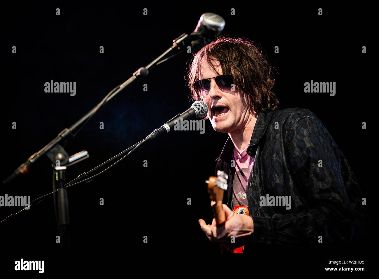 Roskilde, Denmark. July 05th, 2019. The English space rock band Spiritualized performs a live concert during the Danish music festival Roskilde Festival 2019. Here singer and musician Jason Pierce is seen live on stage. (Photo credit: Gonzales Photo - Christian Hjorth). Stock Photo