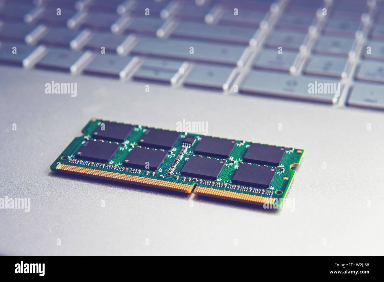 DDR3 sodimm RAM memory card module in black laptop closeup Stock Photo