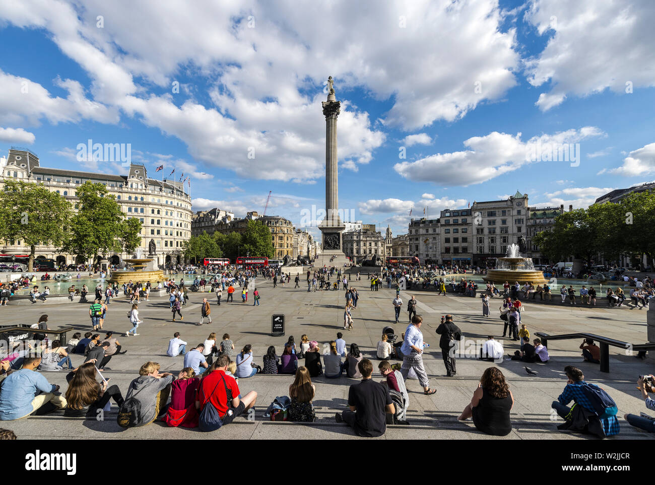 Busy Trafalgar Square, London in summer time Stock Photo