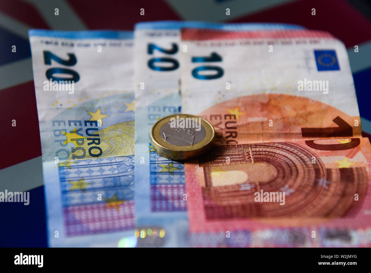 July 9, 2019 - Poland - In this photo illustration the twenty and ten euros  bank notes are seen with United Kingdom flag on the background. (Credit Image: © Omar Marques/SOPA Images via ZUMA Wire) Stock Photo