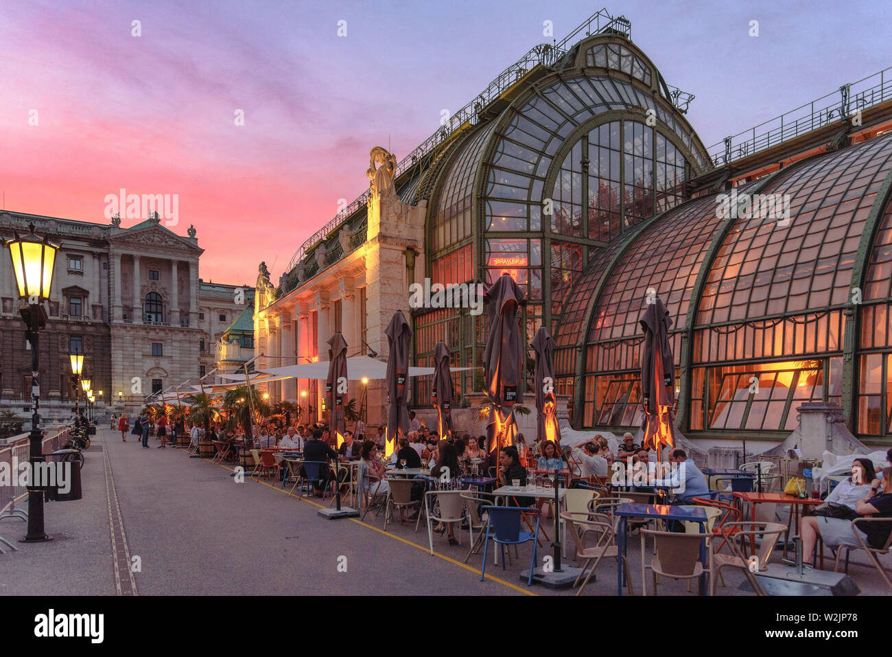 The art nouveau Schmetterlinghaus and Palmenhaus in Vienna, Austria at dusk with a beautiful sky Stock Photo