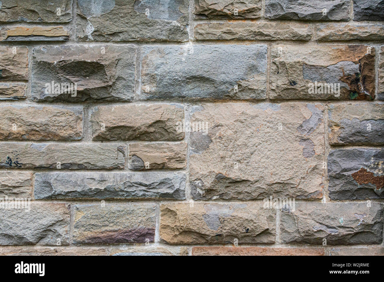 A wall built with stone blocks Stock Photo