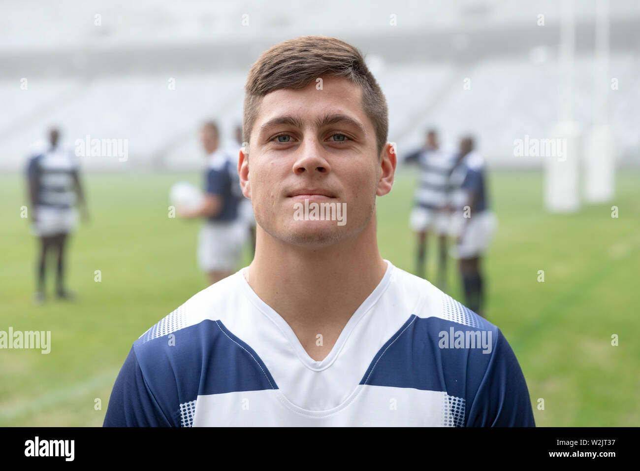 Caucasian Male rugby player standing in stadium Stock Photo Alamy
