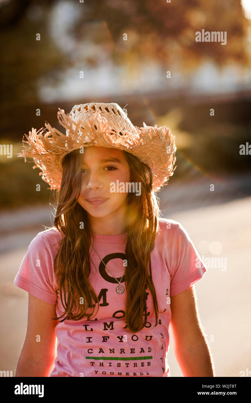 Girl with a straw hat hi-res stock photography and images - Alamy