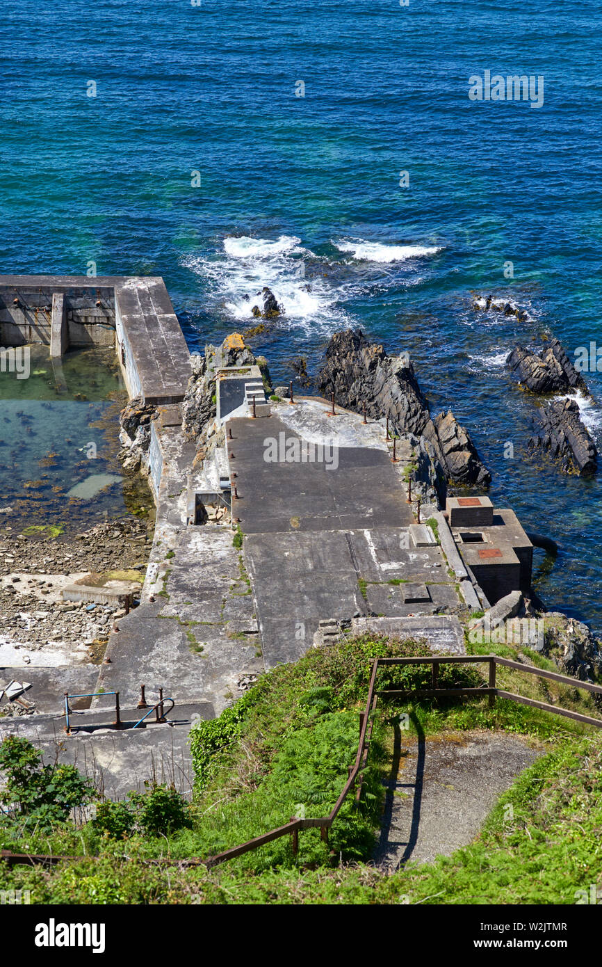 A deserted and abandoned sea swimming pool in Port Erin, Isle of Man Stock Photo
