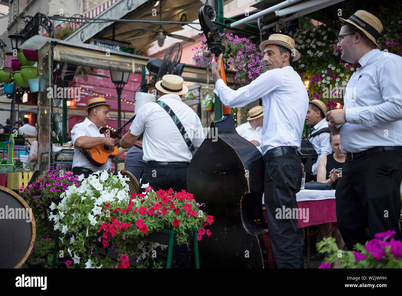 Belgrade, Serbia July 5th 2019: Musicians performing in one of the restaurants in touristic Skadarska Street also known as Skadarlija Stock Photo
