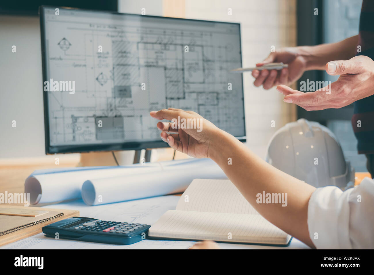 Team of Construction engineering or architect hands working on