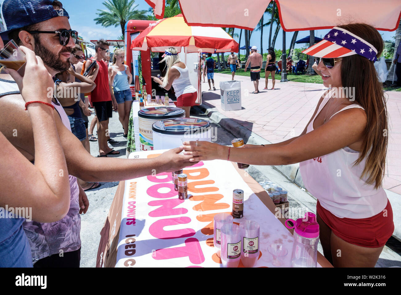 Miami Beach Florida,North Beach,Fire on the Fourth Festival July 4th annual free sample,Dunkin' Donuts Shot in the Dark espresso blend coffee,Hispanic Stock Photo