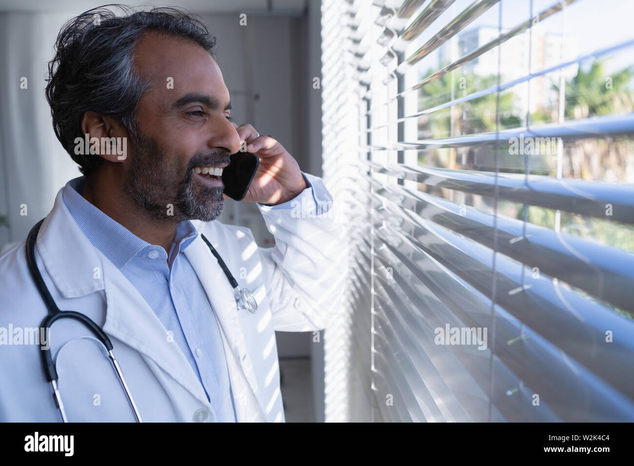 Mature person talking doctor hi-res stock photography and images - Alamy