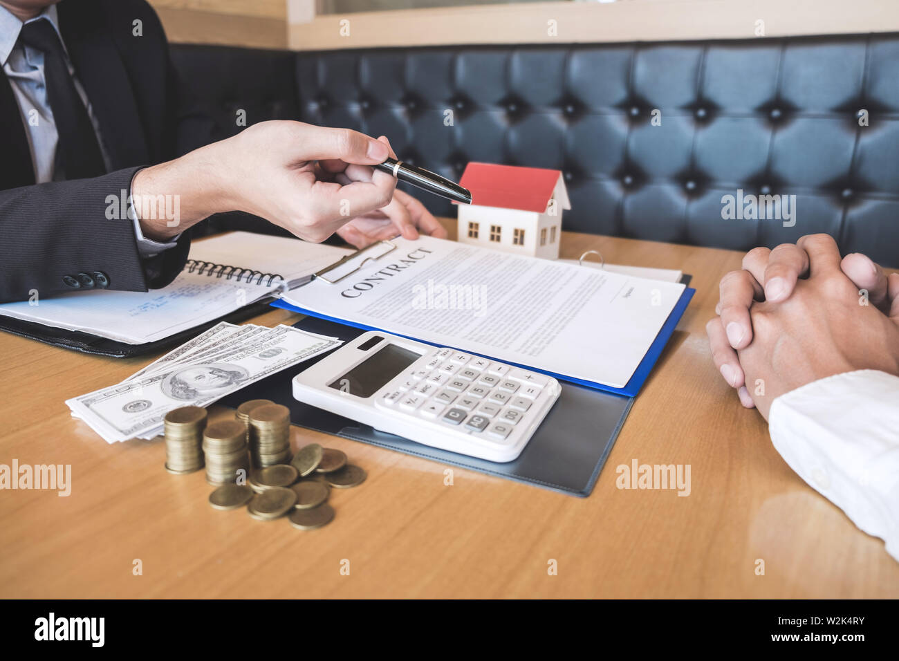 Client signing mortgage loan agreement hi-res stock photography and ...