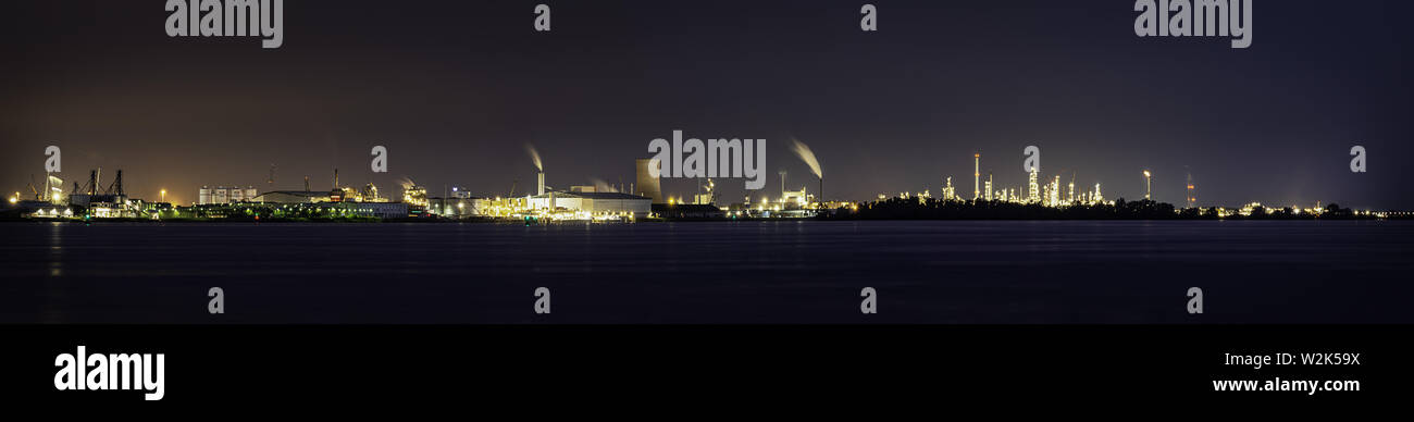 Power plant on the river in the night, panoramic photo, long exposure Stock Photo