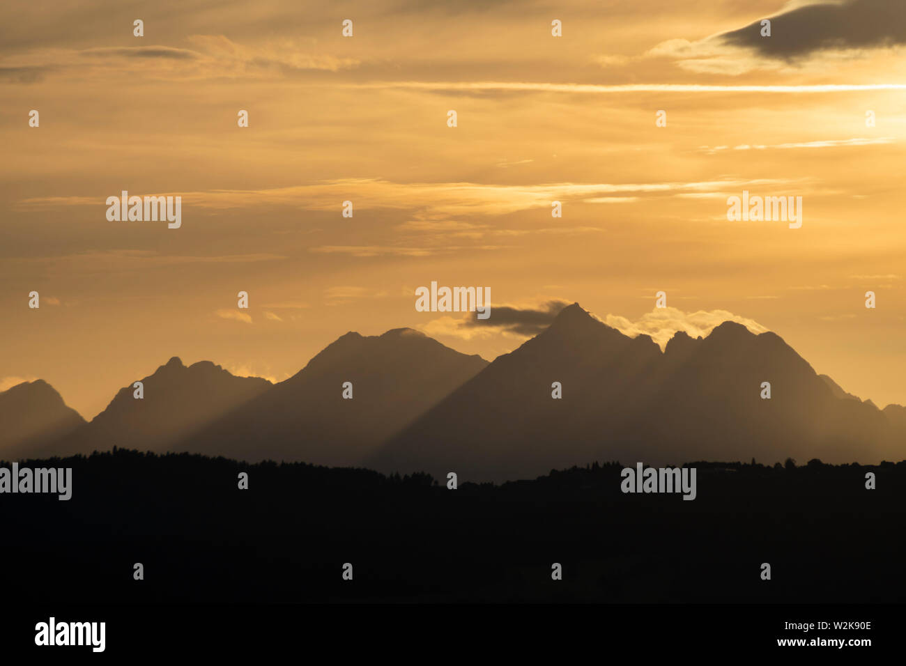 View by the setting sun of the Tatras from Spis Castle. Slovakia. Stock Photo