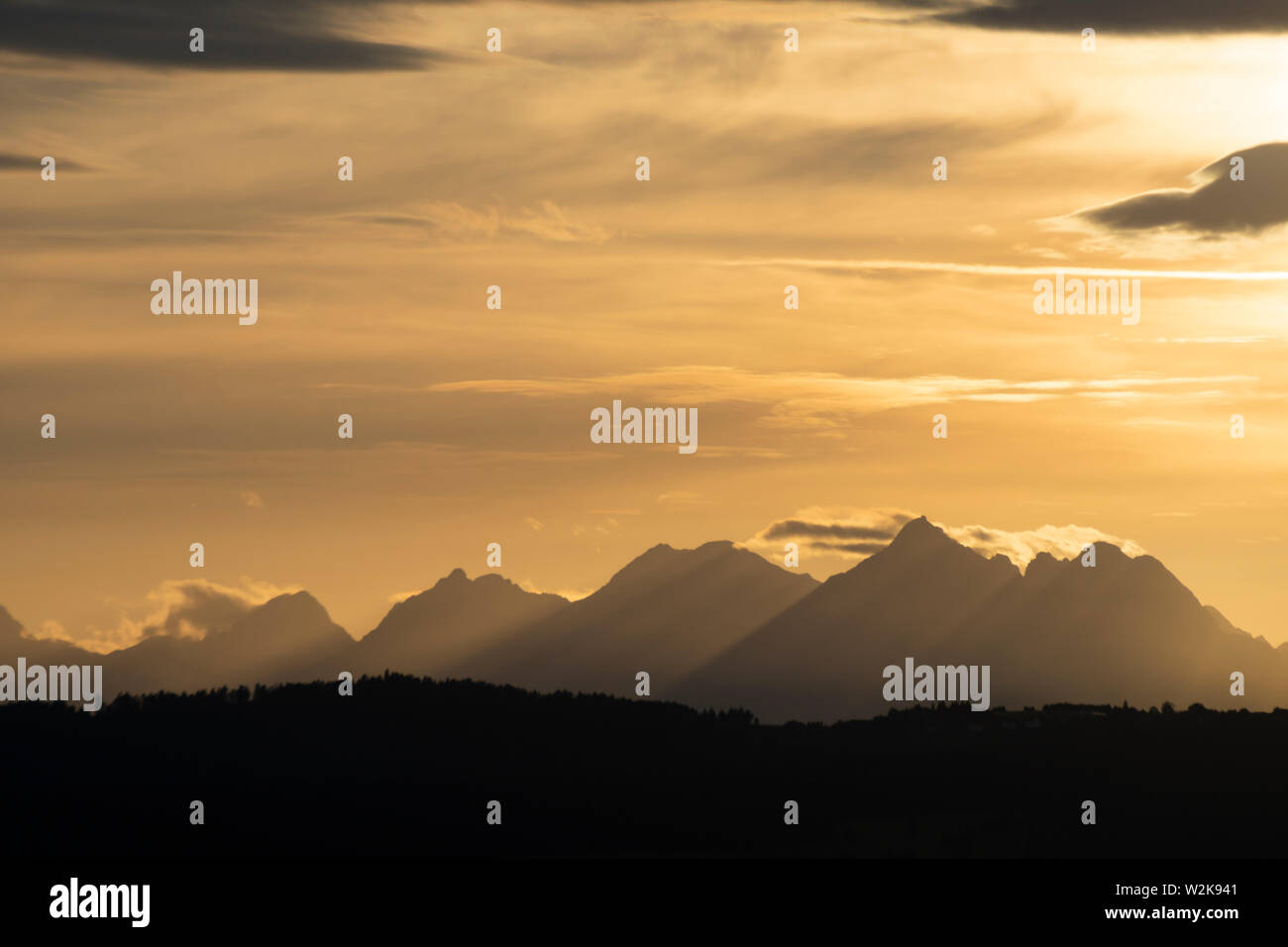 View by the setting sun of the Tatras from Spis Castle. Slovakia. Stock Photo