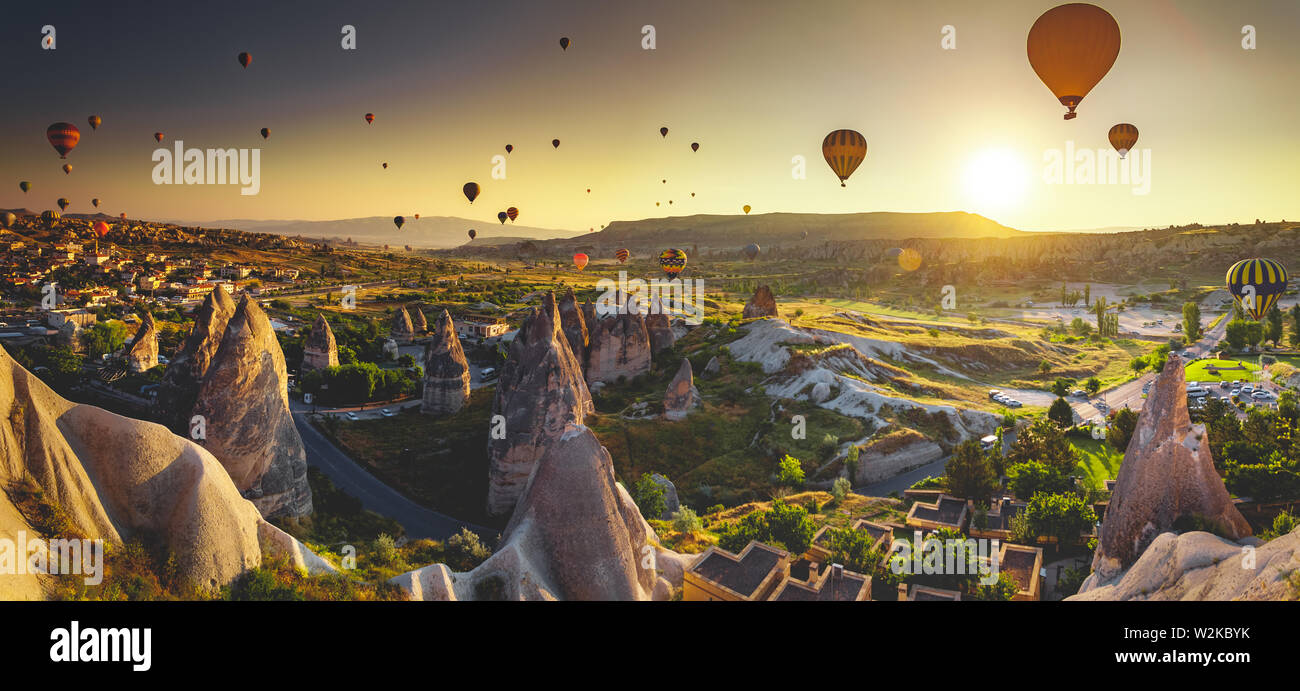 Hot air balloon flying over spectacular Cappadocia Stock Photo