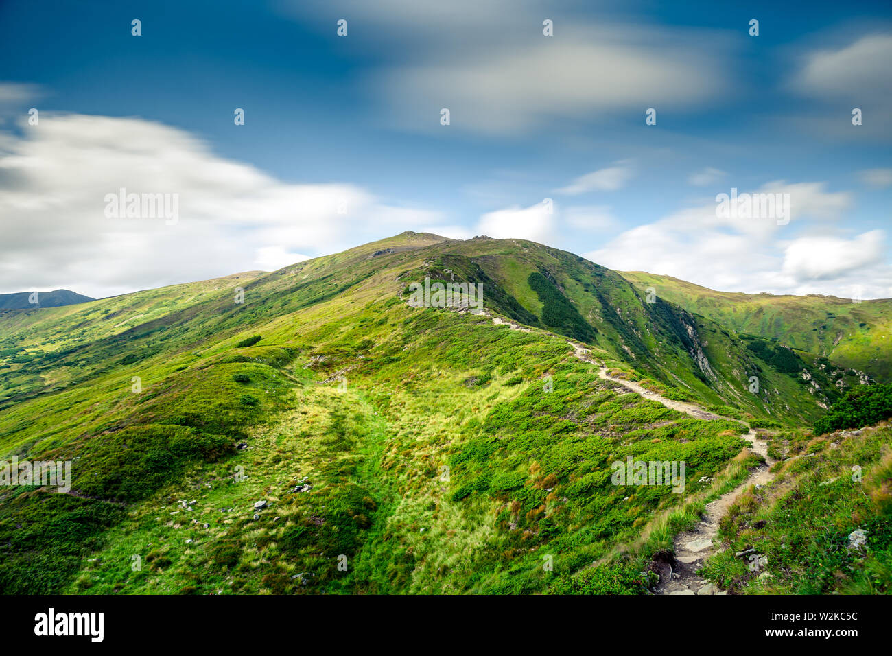 summer landscape. Beautiful mountains on the blue sky background Stock Photo