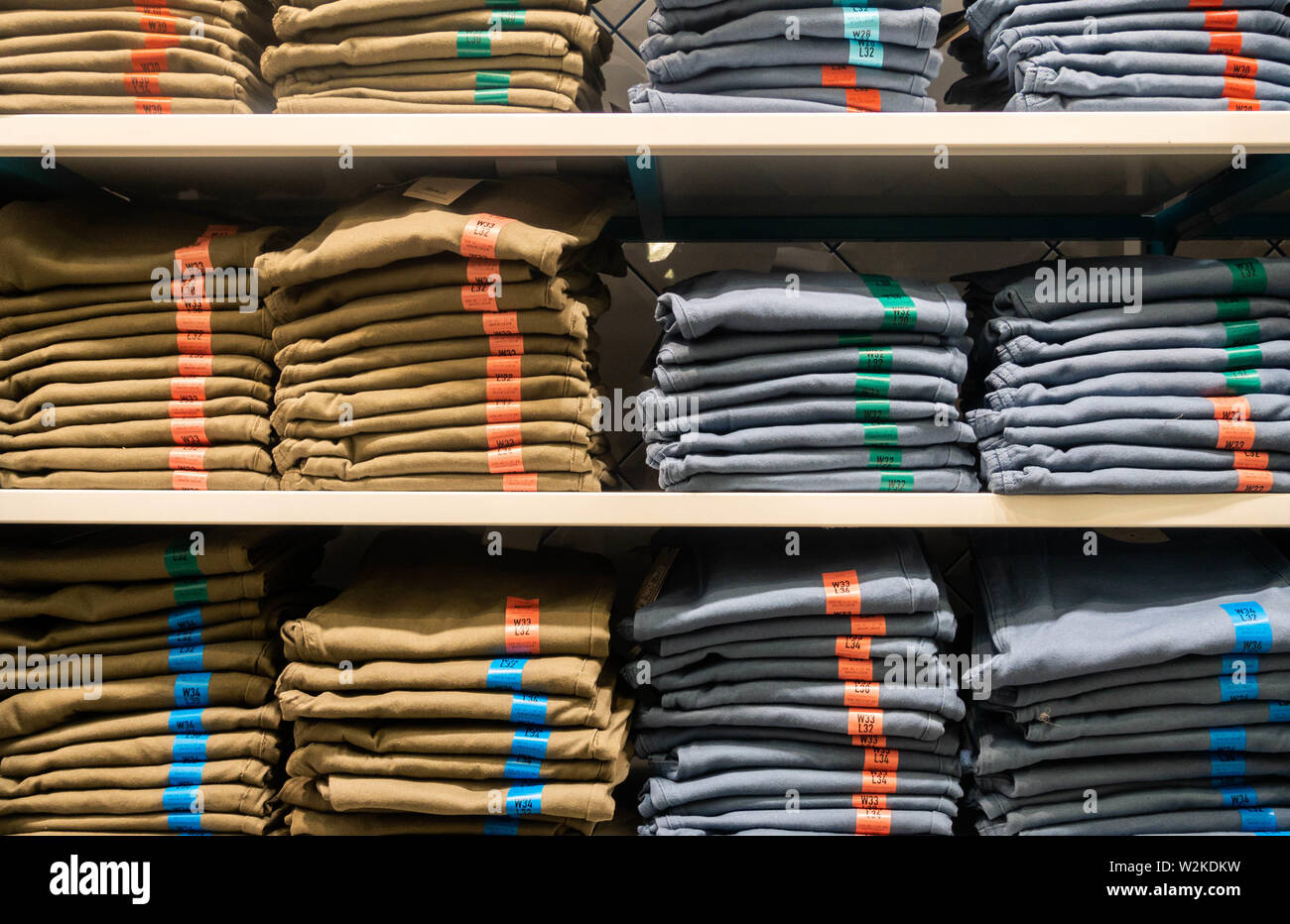 Denim jeans in Primark store. England. UK Stock Photo
