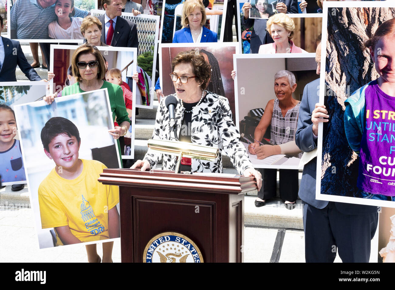 Washington, D.C, USA. 9th July, 2019. U.S. Senator JACKY ROSEN (D-NV) in front of a group of Democratic Senators and Representatives on the steps of the U.S. Capitol speaking against the ''assault on protections for people with pre-existing conditions'', on the steps of the US Capitol in Washington, DC on July 9, 2019. Credit: Michael Brochstein/ZUMA Wire/Alamy Live News Stock Photo