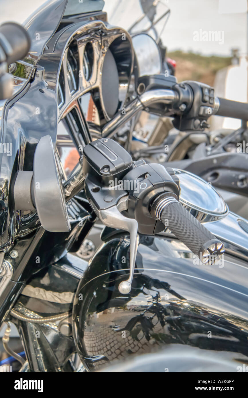 Several customized shiny black motorcycles Stock Photo