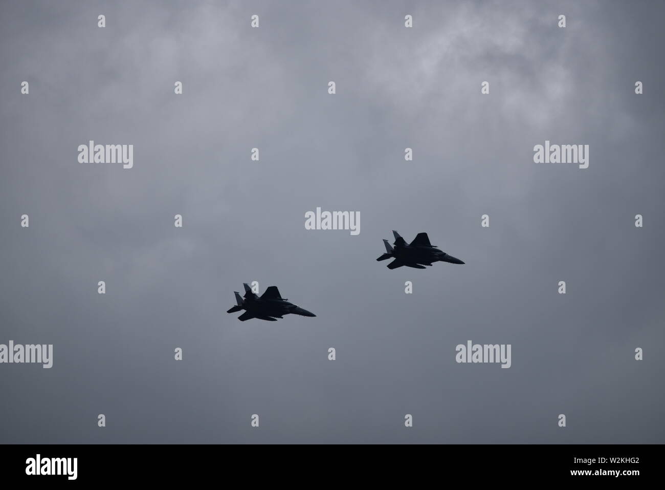 f 15 eagle jet fighter USAF flying past against a cloudy sky Stock ...