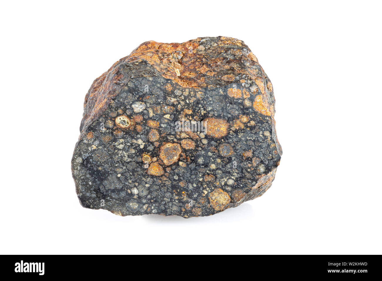 Carbonaceous Chondrite Meteorite Cross-section (CV3) formed by accretion of dust, small grains and calcium-aluminum-righ inclusions (CAIs) in the earl Stock Photo