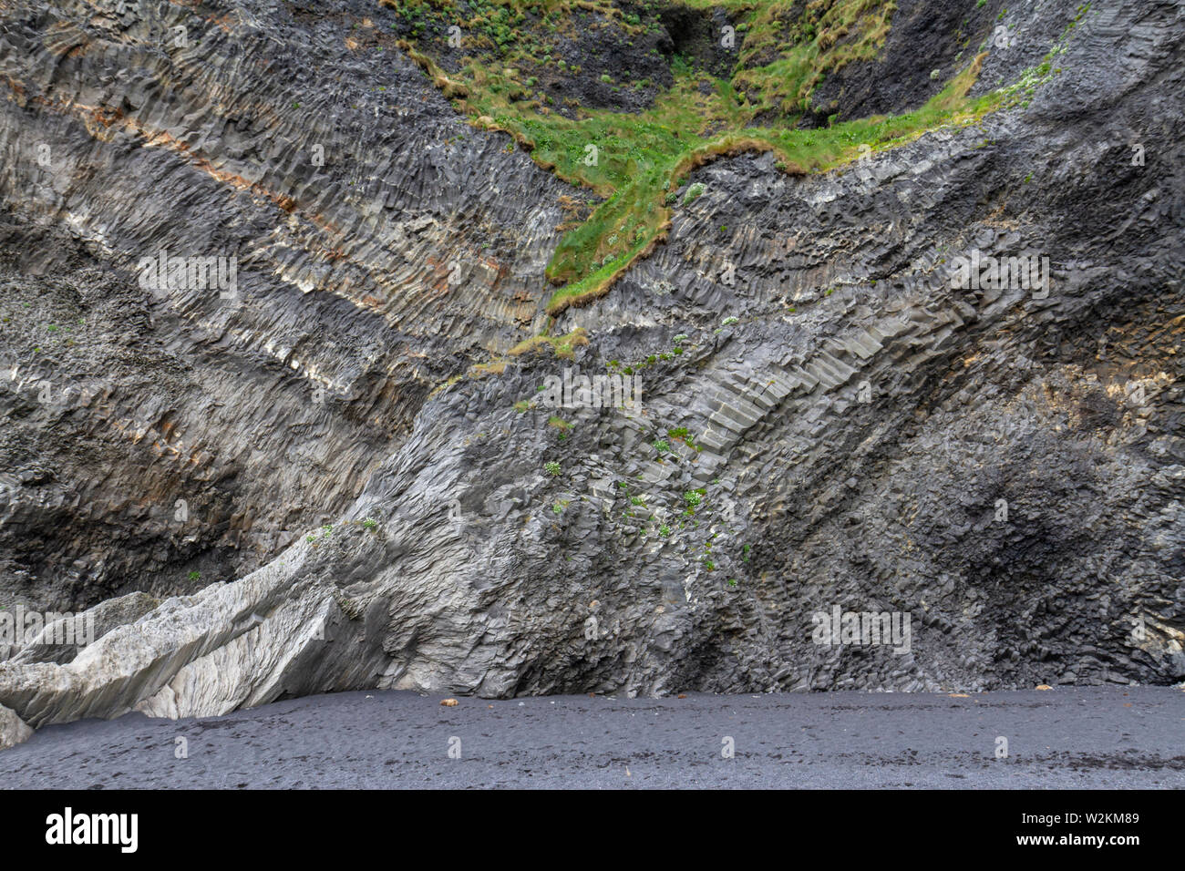 A section of the basalt columns on Reynisfjara black sand beach ...