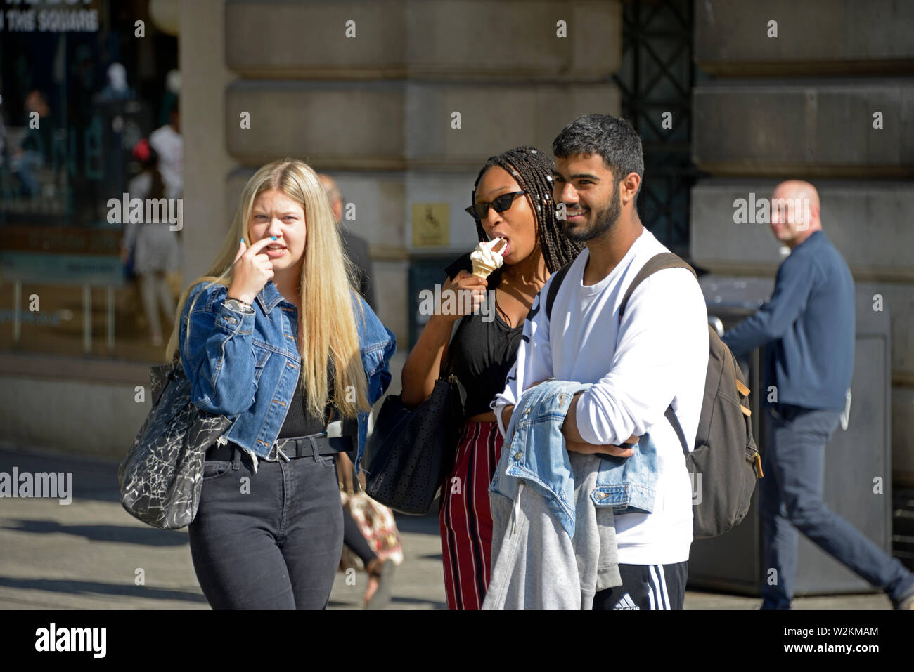 Mixed racial group, in the street. Stock Photo