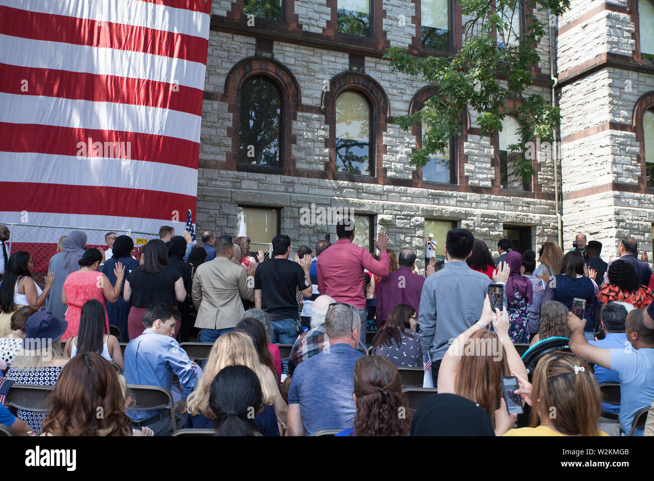 Oath of allegiance by new citizens at Naturalization ceremony on July 4