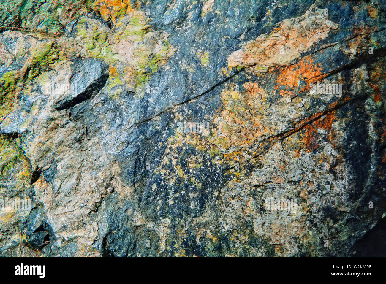 Natural Surface texture of serpentinite. Background with green mineral ...