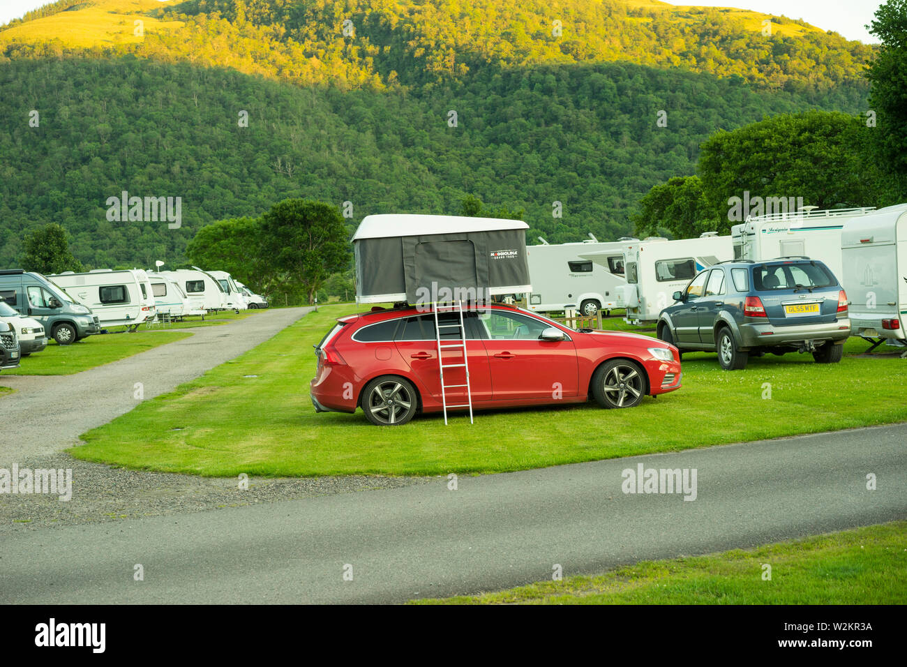 Unorthodox camping equipment on top of a car, Scotland, UK. Stock Photo