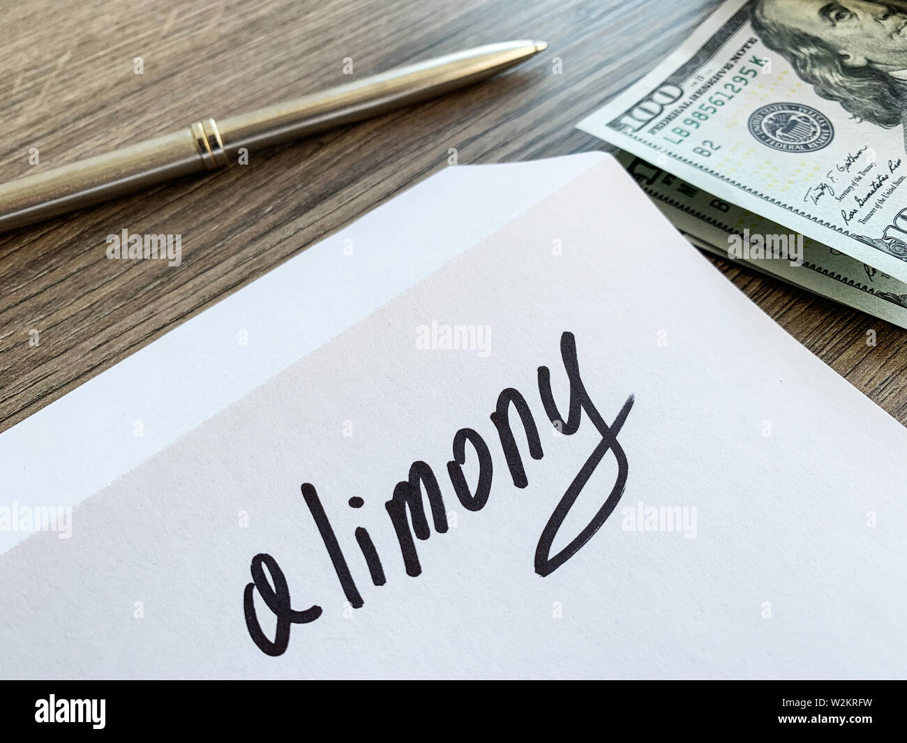 Payments alimony. White envelope with sign alimony and money Stock ...