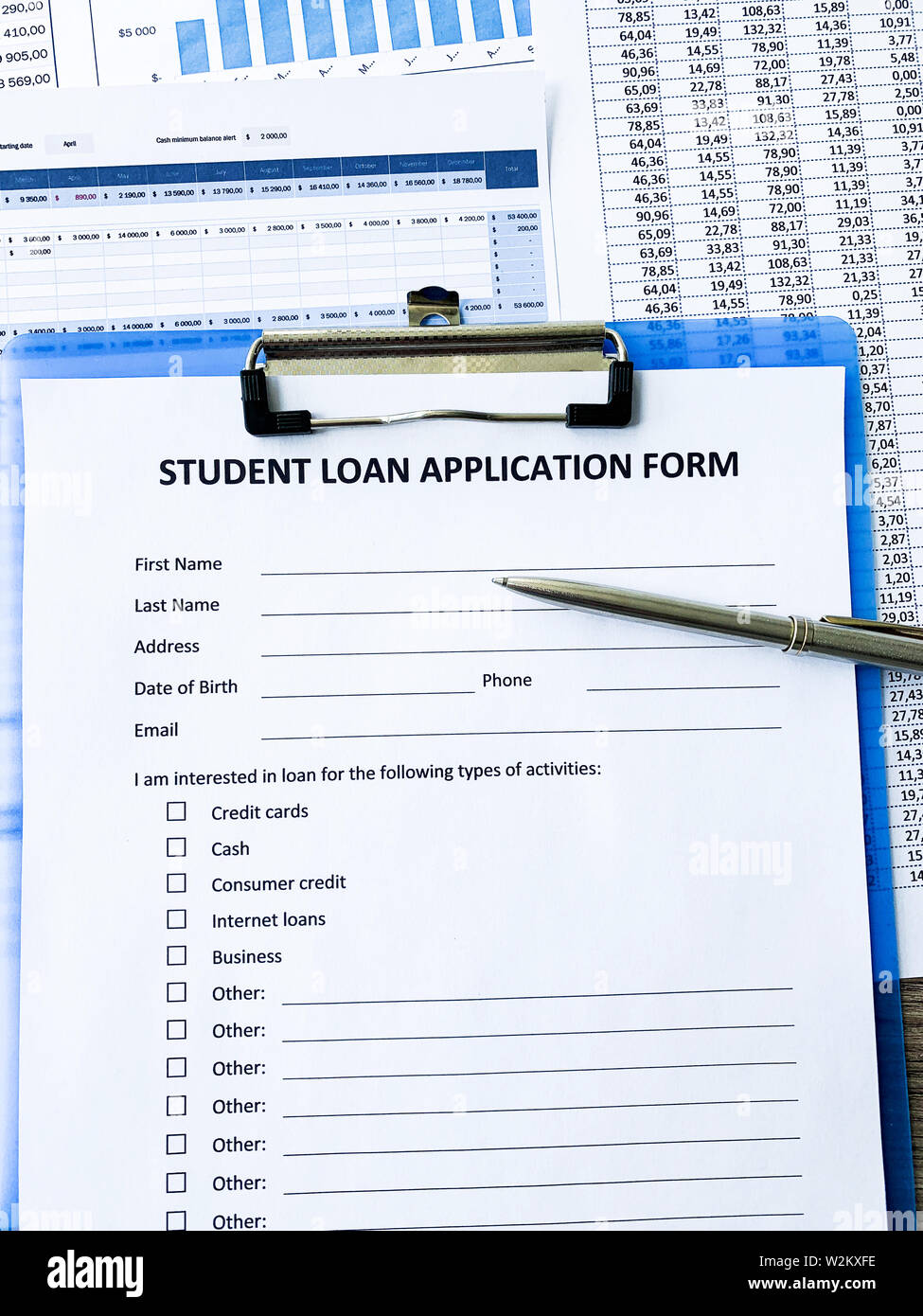 Student loan application form document on table Stock Photo