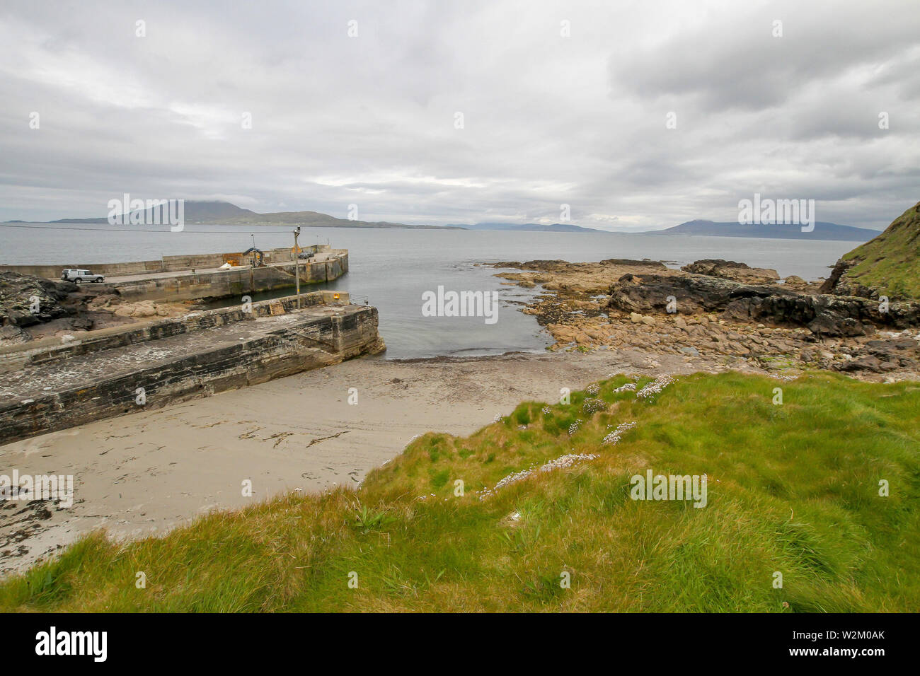 Harbour on Wild Atlantic Way Ireland, to the left is Clare Island in Clew Bay, County Mayo, Ireland as viewed from Roonagh Pier near Louisburgh. . Stock Photo
