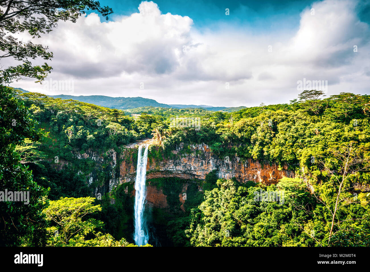 Chamarel waterfall inside the tropical paradise island of Mauritius. Toned image. Stock Photo