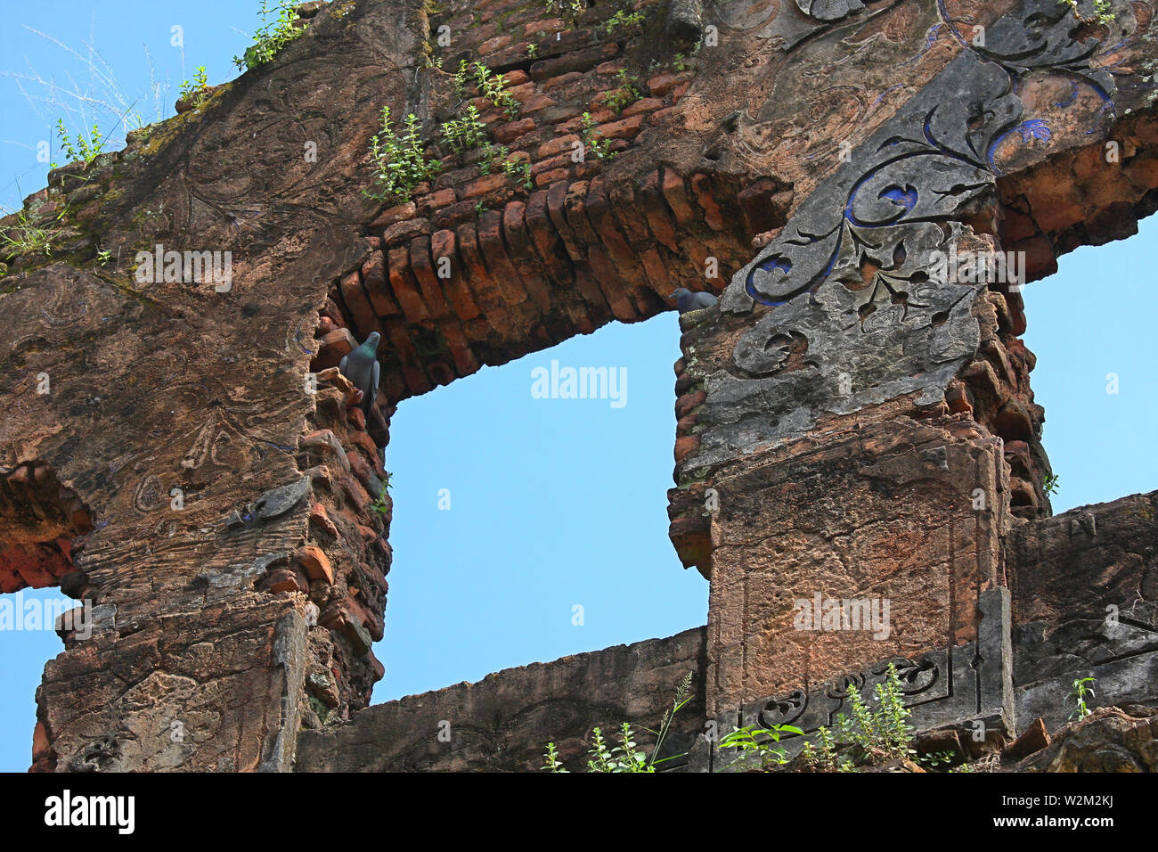 Ruined walls bearing signs of the past, in the Folk art and crafts