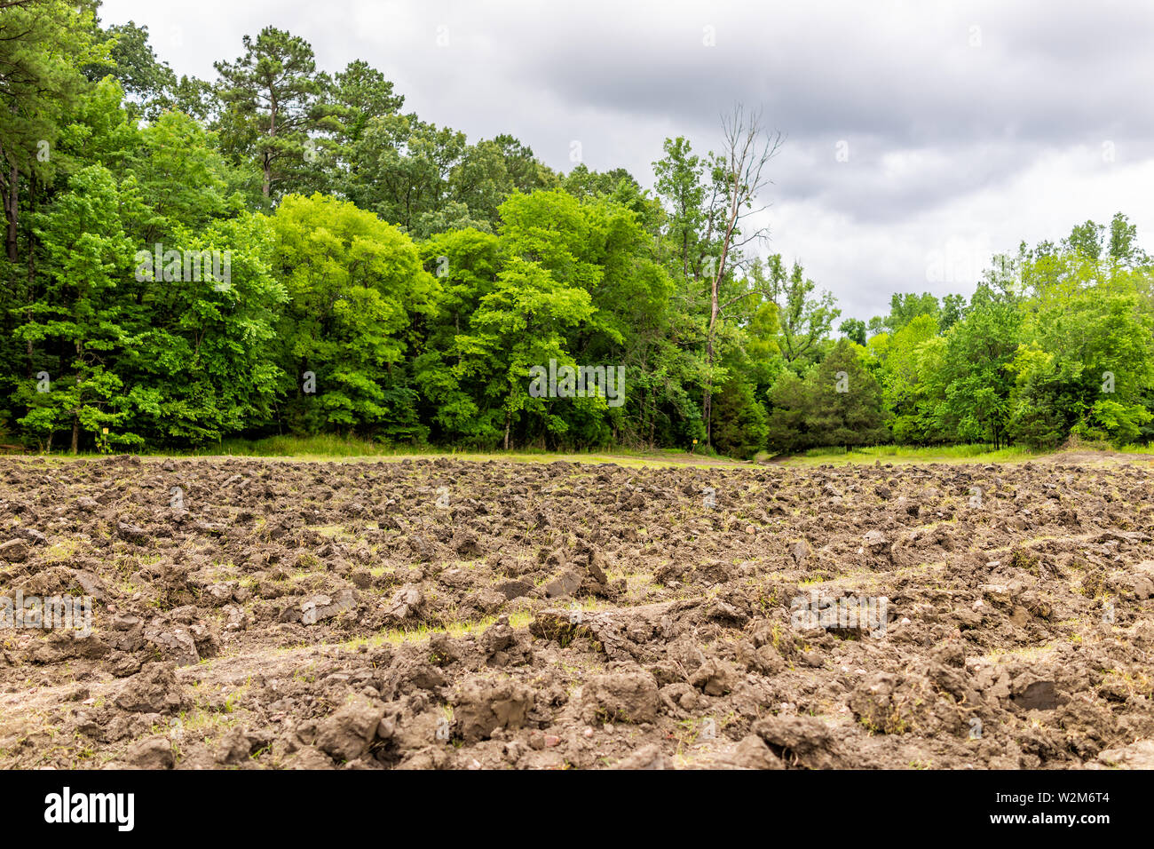 Crater of Diamonds State Park with plowed brown soil in Arkansas dirt landscape meadow field and nobody Stock Photo