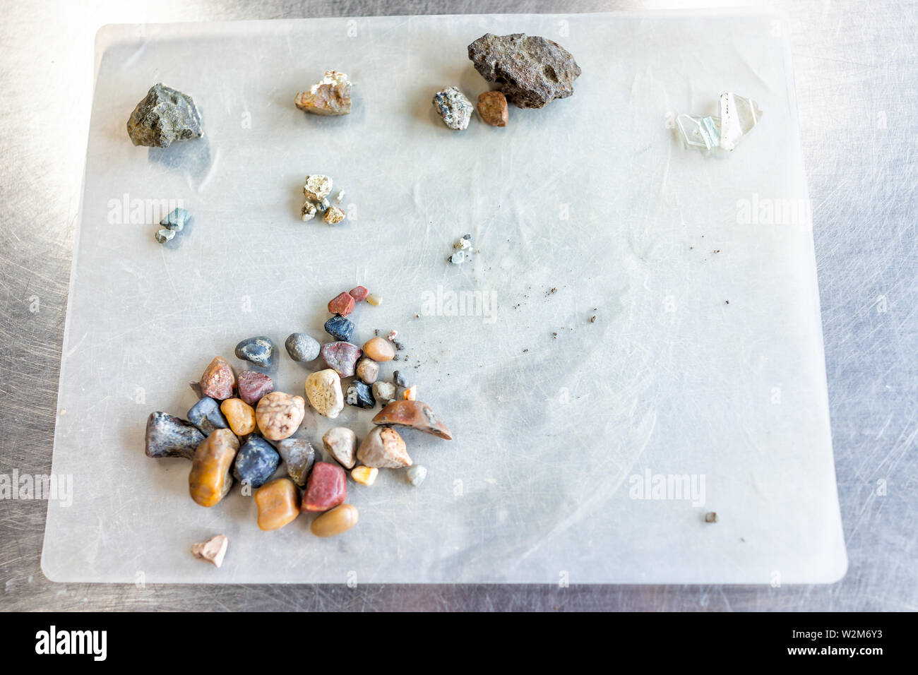 Crater of Diamonds State Park in Arkansas with closeup of gemstones found in ground sifted and
