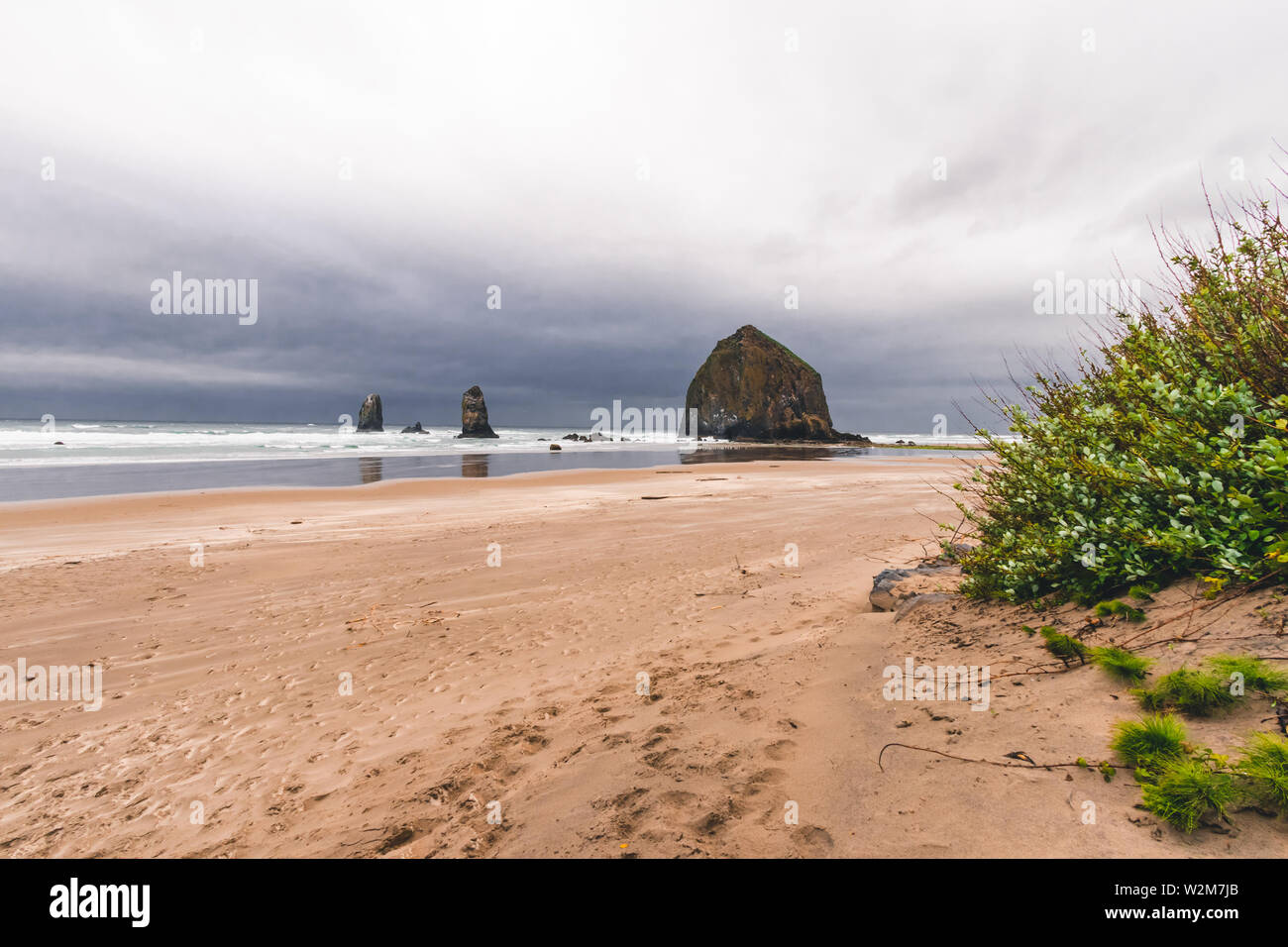 Cannon Beach is a city in Clatsop County, Oregon, United States, dramatic weather before a rain storm, tourism, Travel USA, sand, landscape, cityscape Stock Photo