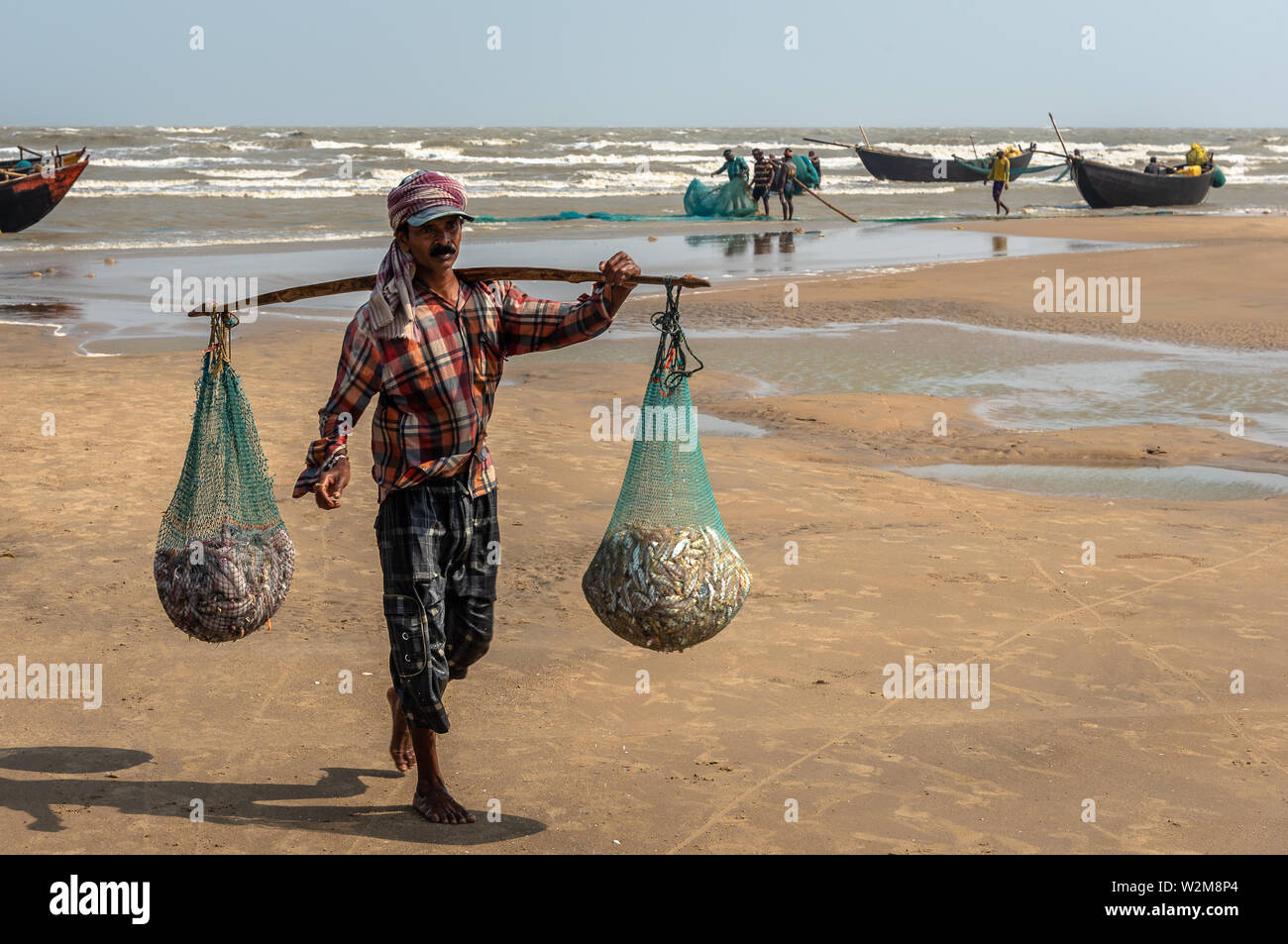 Fisherman carrying fishing net hi-res stock photography and images - Alamy