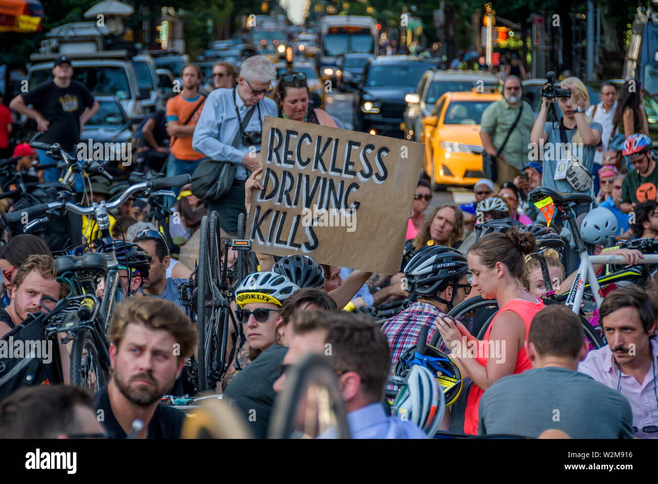 New York, USA. July 9, 2019, New York, New York, USA: Hundreds of New Yorkers who bike joined the NYC Bike Family, a coalition of over 15 bicycle advocacy groups at a mass die-in in Washington Square Park, a non-violent, peaceful memorial event to protest the killing of cyclists. Credit: Erik McGregor/ZUMA Wire/Alamy Live News Stock Photo