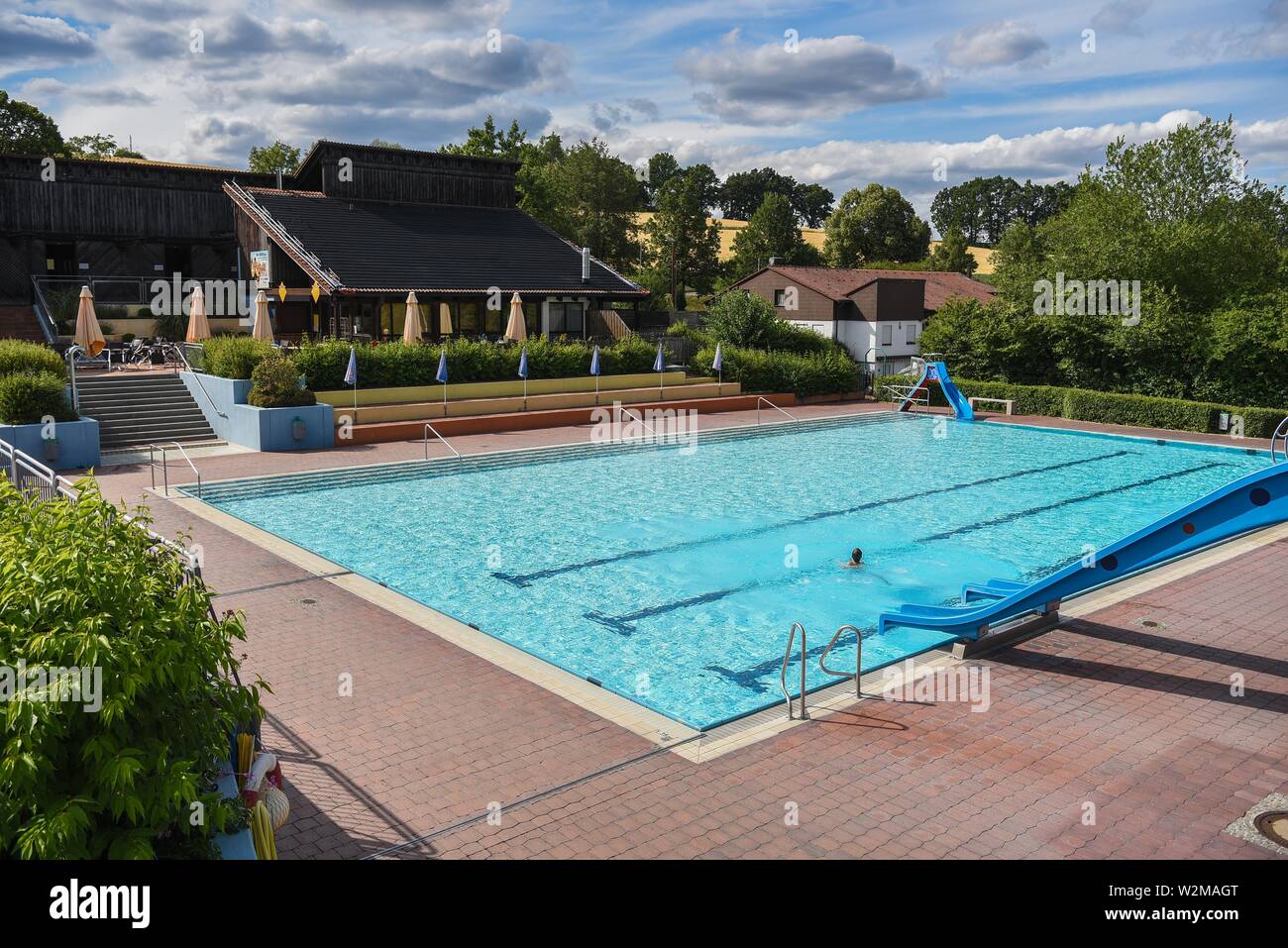 Windischeschenbach, Germany. 08th July, 2019. The non-swimmer pool of the outdoor pool. 13-year-old Justin saved the life of a four-year-old boy on June 4. Justin noticed the boy at the bottom of the non-swimmer's pool, pulled him out of the water and called adults for help, who immediately started a cardiac massage. Credit: Nicolas Armer/dpa/Alamy Live News Stock Photo