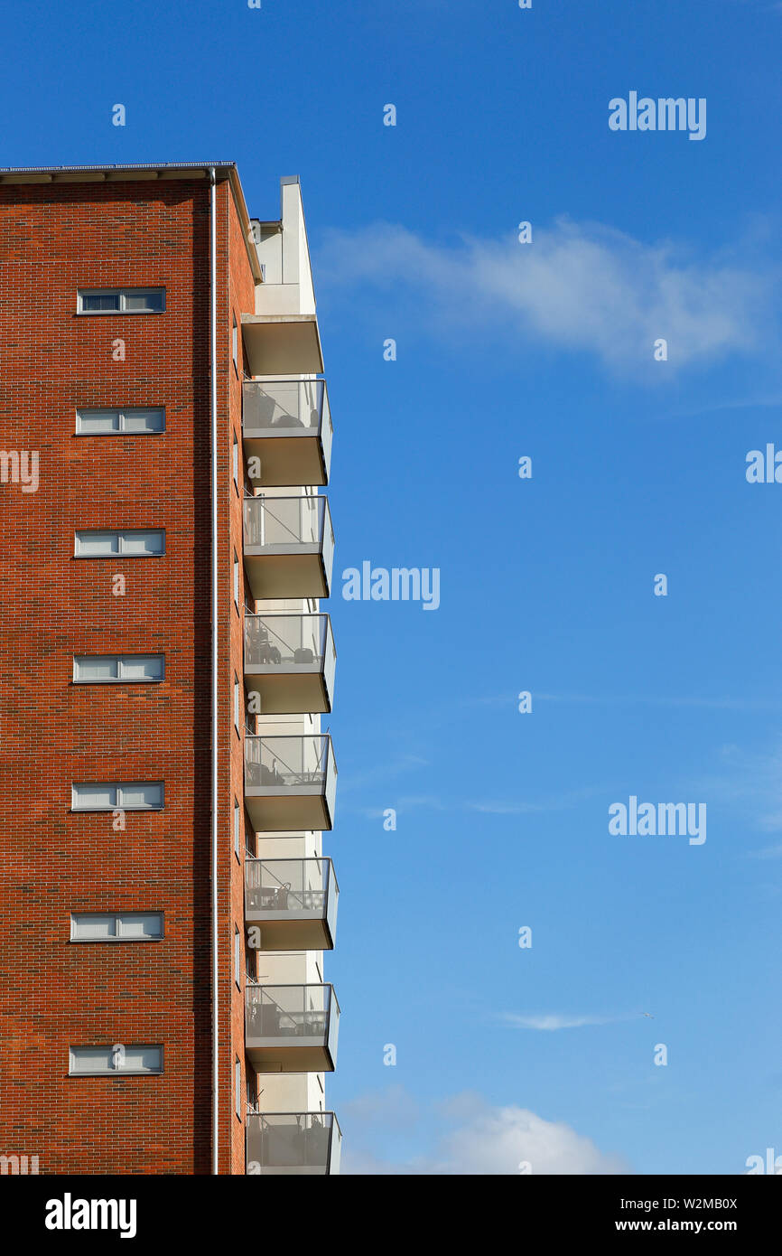 Exterior view of multi-story apartment residential building. Stock Photo