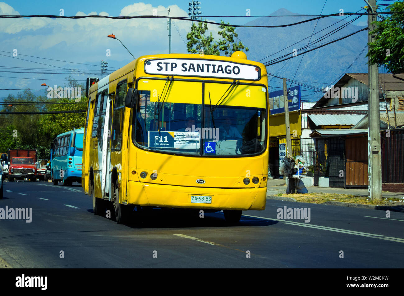 SANTIAGO, CHILE - NOVEMBER 2014: A yellow Transantiago bus in Puente Alto Stock Photo